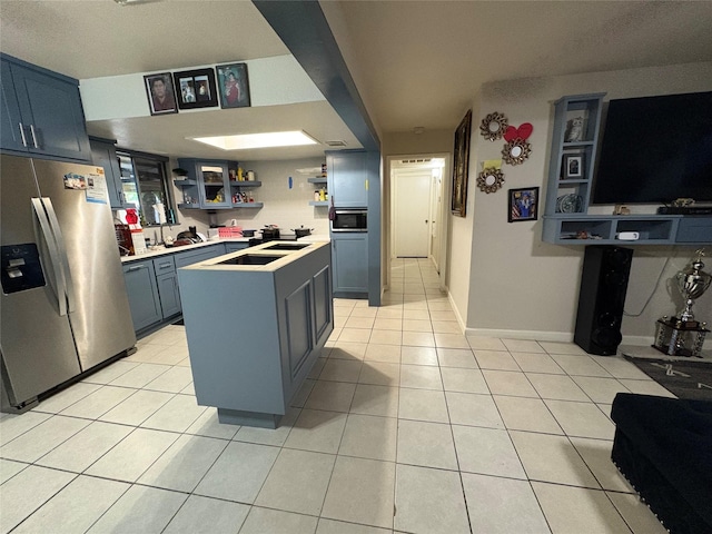 7722 Breezeway St, Houston, TX 77040 - kitchen featuring stainless steel refrigerator with ice dispenser, open shelves, light tile patterned flooring, light countertops, and a center island