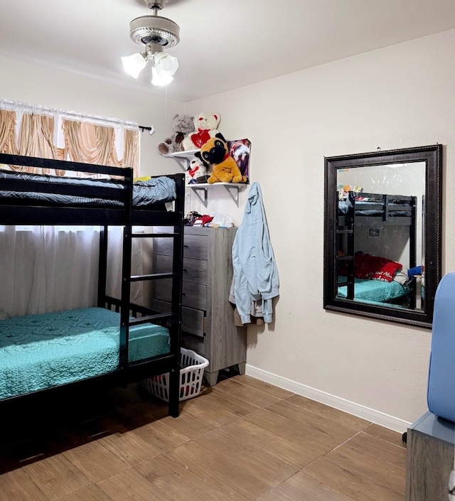 7722 Breezeway St, Houston, TX 77040 - bedroom featuring wood finished floors