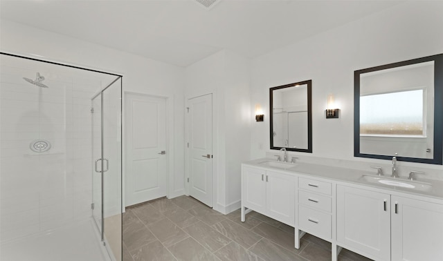21230 Blue Bluff Dr, Cypress, TX 77433 - bathroom featuring a stall shower, double vanity, and marble look tiles