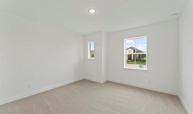 21230 Blue Bluff Dr, Cypress, TX 77433 - unfurnished room with light colored carpet and a smoke detector