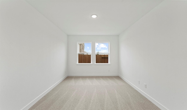 21230 Blue Bluff Dr, Cypress, TX 77433 - unfurnished room with baseboards and light colored carpet