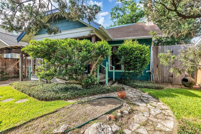 1501 Bonnie Brae St, Houston, TX 77006 - rear view of house featuring a chimney and a shingled roof