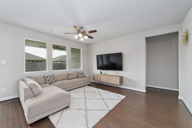 187 Solana Point Dr, Katy, TX 77493 - living area featuring a ceiling fan and dark wood-style floors