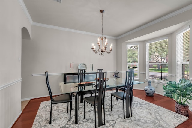 13811 Brannon Field Ln, Houston, TX 77041 - dining room with wood finished floors, ornamental molding, a chandelier, and arched walkways