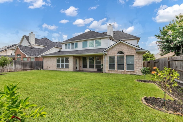 13811 Brannon Field Ln, Houston, TX 77041 - rear view of property with a fenced backyard, brick siding, and roof with shingles