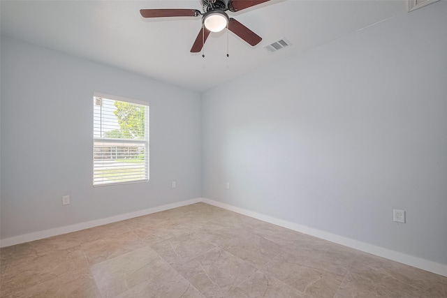 52 Penway St, Houston, TX 77022 - spare room with a ceiling fan and baseboards