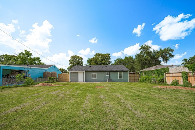 52 Penway St, Houston, TX 77022 - rear view of house featuring a fenced backyard
