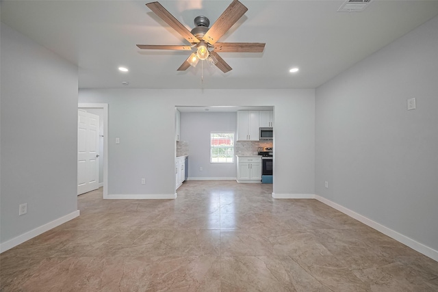 52 Penway St, Houston, TX 77022 - unfurnished living room with a ceiling fan and recessed lighting