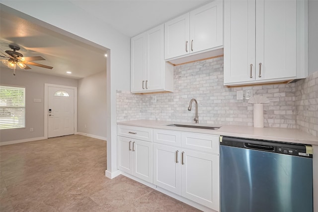 52 Penway St, Houston, TX 77022 - kitchen featuring dishwasher, light countertops, decorative backsplash, ceiling fan, and white cabinets