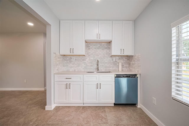 52 Penway St, Houston, TX 77022 - kitchen with dishwasher, light countertops, white cabinetry, decorative backsplash, and recessed lighting