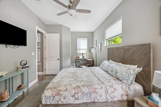 1219 W 25th St Unit A, Houston, TX 77008 - bedroom with wood finished floors and ceiling fan