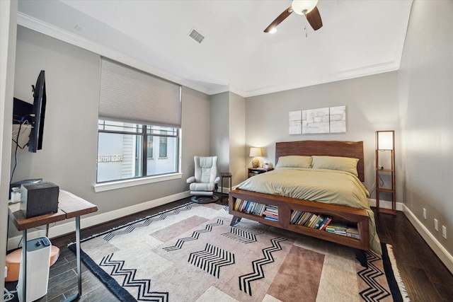 1219 W 25th St Unit A, Houston, TX 77008 - bedroom with wood finished floors, crown molding, and a ceiling fan