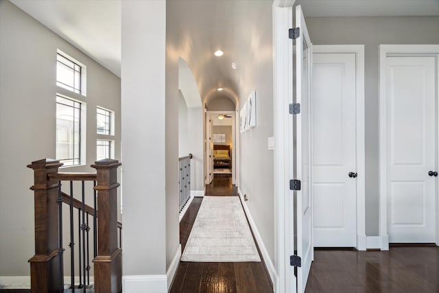 1219 W 25th St Unit A, Houston, TX 77008 - corridor with dark wood finished floors, an upstairs landing, and arched walkways