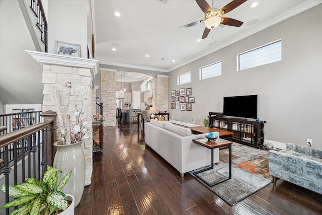 1219 W 25th St Unit A, Houston, TX 77008 - living area featuring ceiling fan, ornate columns, wood-type flooring, ornamental molding, and arched walkways