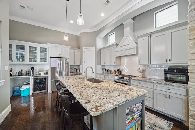 1219 W 25th St Unit A, Houston, TX 77008 - kitchen with custom exhaust hood, beverage cooler, stainless steel appliances, tasteful backsplash, and ornamental molding