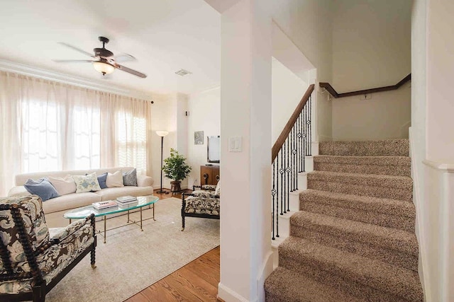 1616 Southmore Blvd, Houston, TX 77004 - living area with stairway, a ceiling fan, wood finished floors, and crown molding