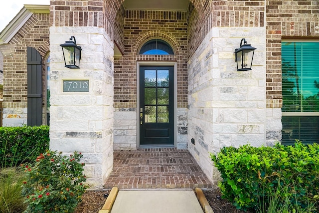 17010 Harpers Way, Conroe, TX 77385 - view of exterior entry with brick siding and stone siding