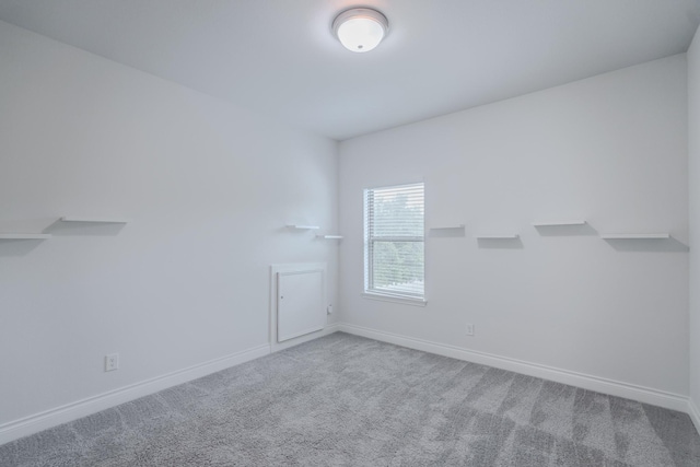 17010 Harpers Way, Conroe, TX 77385 - empty room featuring carpet floors and baseboards