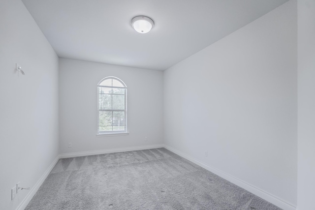 17010 Harpers Way, Conroe, TX 77385 - empty room with carpet flooring and baseboards