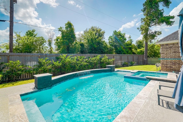 17010 Harpers Way, Conroe, TX 77385 - view of pool with a fenced backyard and a pool with connected hot tub