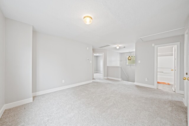 20931 Walder Ct, Katy, TX 77449 - carpeted spare room with attic access and a textured ceiling