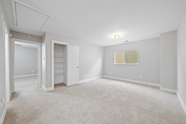 20931 Walder Ct, Katy, TX 77449 - unfurnished bedroom with attic access, carpet floors, and a closet