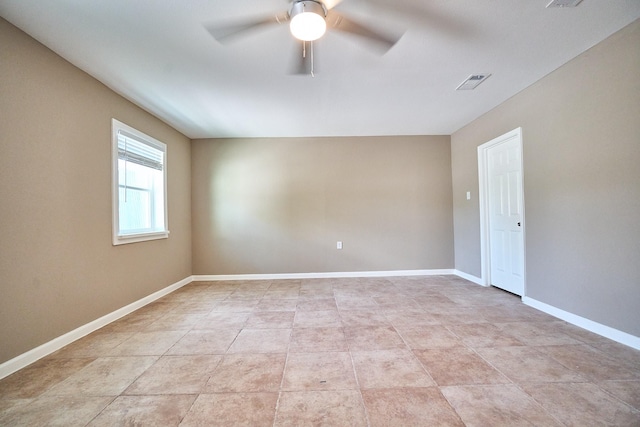 12234 Dumas St, Houston, TX 77034 - spare room with ceiling fan and light tile patterned floors