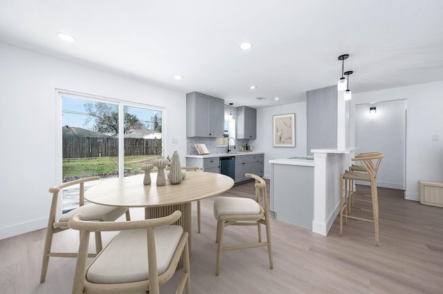 6615 Dewville Ln, Houston, TX 77076 - dining space featuring light wood-type flooring and recessed lighting