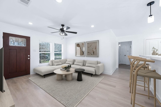 6615 Dewville Ln, Houston, TX 77076 - living area featuring light wood-style flooring, recessed lighting, and a ceiling fan