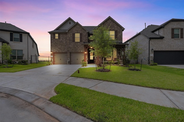 1224 Garden Jade Dr, Katy, TX 77493 - traditional home featuring a garage, concrete driveway, brick siding, and stone siding