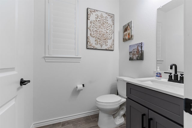1224 Garden Jade Dr, Katy, TX 77493 - half bathroom with vanity and wood finish floors
