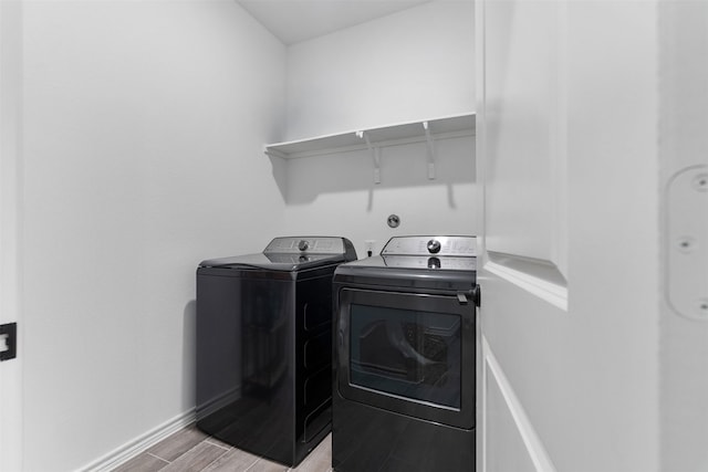 1224 Garden Jade Dr, Katy, TX 77493 - laundry area featuring independent washer and dryer and light wood-style flooring