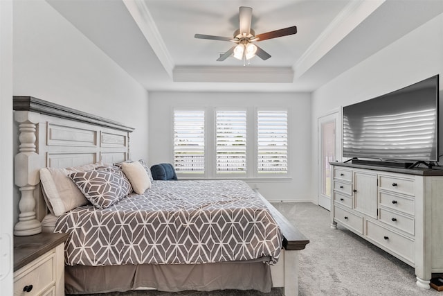 1224 Garden Jade Dr, Katy, TX 77493 - bedroom featuring light carpet, a tray ceiling, ornamental molding, and a ceiling fan