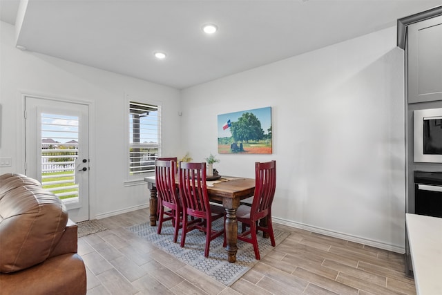 1224 Garden Jade Dr, Katy, TX 77493 - dining space featuring light wood-style floors and recessed lighting