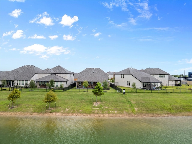 1224 Garden Jade Dr, Katy, TX 77493 - rear view of house featuring a fenced backyard, a water view, and a residential view