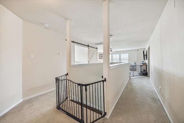 18314 Harvest Star Ct, Houston, TX 77084 - hallway with carpet and an upstairs landing