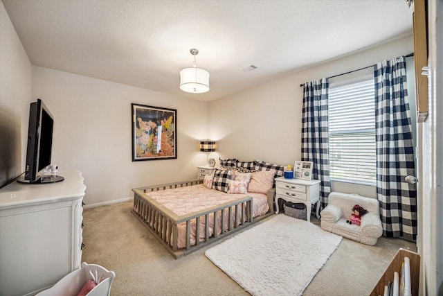 18314 Harvest Star Ct, Houston, TX 77084 - bedroom with light carpet and baseboards