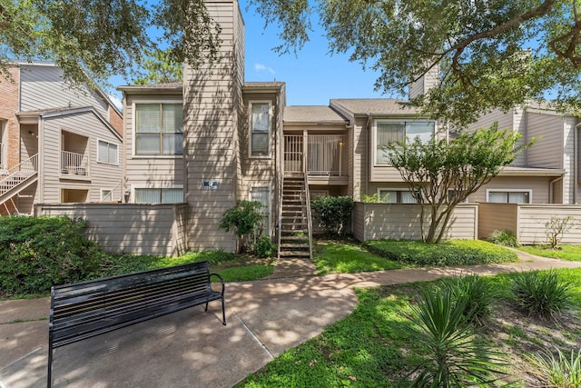 6701 Sands Point Dr Unit 114, Houston, TX 77074 - view of property featuring stairway