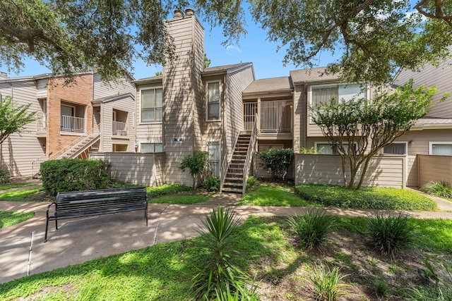 6701 Sands Point Dr Unit 114, Houston, TX 77074 - view of building exterior with stairs