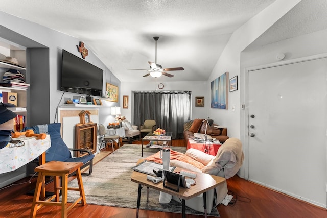 6701 Sands Point Dr Unit 114, Houston, TX 77074 - living area featuring vaulted ceiling, a ceiling fan, and wood finished floors
