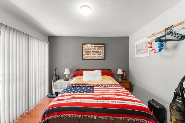 6701 Sands Point Dr Unit 114, Houston, TX 77074 - bedroom with wood finished floors