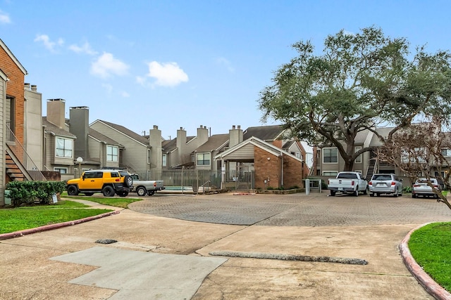6701 Sands Point Dr Unit 114, Houston, TX 77074 - view of street with a residential view and curbs