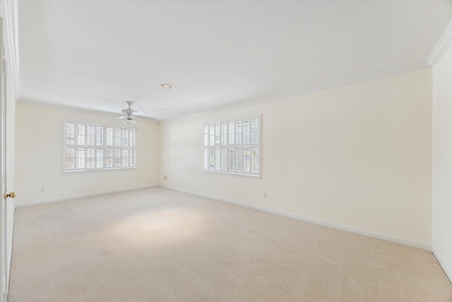 4932 Post Oak Timber Dr, Houston, TX 77056 - empty room with ornamental molding, light colored carpet, plenty of natural light, and a ceiling fan
