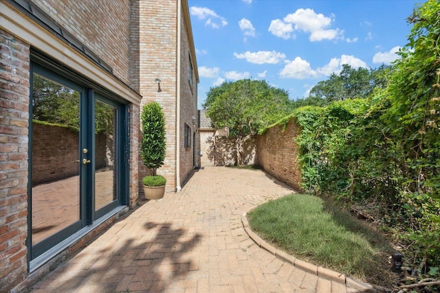 4932 Post Oak Timber Dr, Houston, TX 77056 - fenced backyard with a patio area