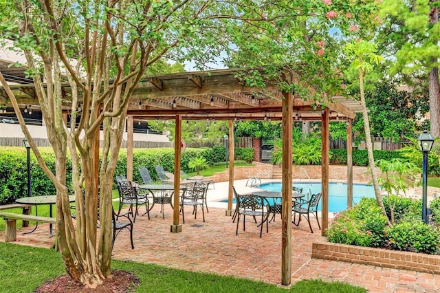 4932 Post Oak Timber Dr, Houston, TX 77056 - fenced backyard with a pergola, a patio area, and outdoor dining space