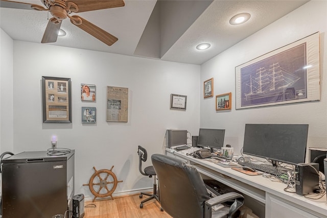 459 Brookwood Dr, Diboll, TX 75941 - office space featuring light wood-style floors, a ceiling fan, and a textured ceiling