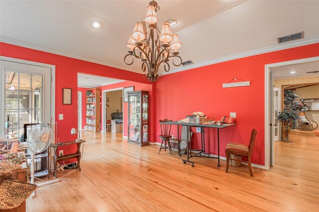 459 Brookwood Dr, Diboll, TX 75941 - dining space with crown molding, wood finished floors, a chandelier, and recessed lighting