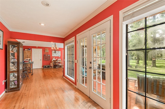 459 Brookwood Dr, Diboll, TX 75941 - doorway to outside with french doors, wood-type flooring, crown molding, a chandelier, and recessed lighting