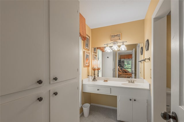 459 Brookwood Dr, Diboll, TX 75941 - bathroom with vanity and baseboards