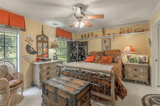 459 Brookwood Dr, Diboll, TX 75941 - bedroom featuring light carpet, ornamental molding, and ceiling fan
